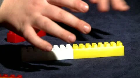 Playing with legos 19 Stock Footage 10820030