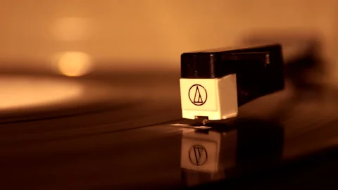 Playing LP vinyl records close up. Low light with reflection. Stock Footage 237152957