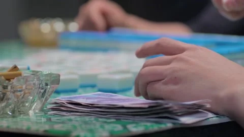 Playing mahjong Stock Footage 235264900