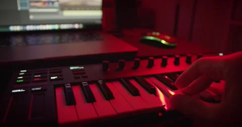 Playing on a midi keyboard Stock Footage 263536244