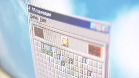 Playing Minesweeper Game on Old Vintage Windows Computer Stock Footage 263822908