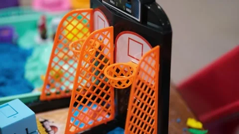 Playing a mini basketball game close up Stock Footage 328117189