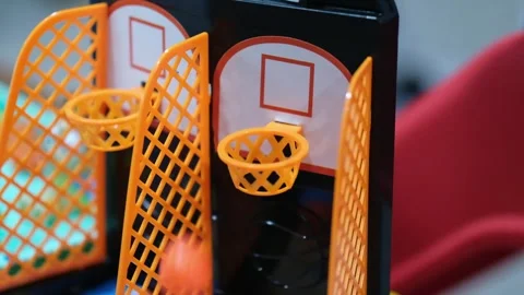 Playing a mini basketball game close up Stock Footage 328117193