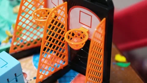 Playing a mini basketball game close up Stock Footage 328117219