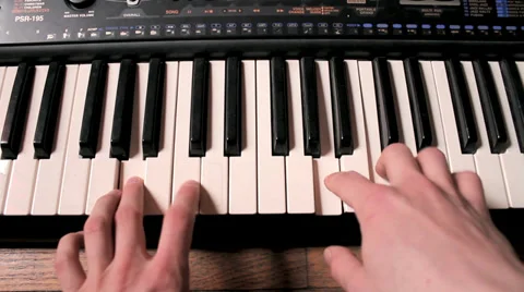 Playing Music On An Electronic Keyboard Stock Footage 37961224