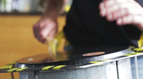 Playing a musical instrument repinique or drum Stock Footage 64312445