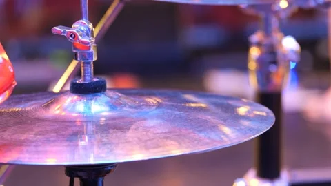 Playing musical instruments, cymbals. Percussion musical instrument close-up. Stock Footage 276910302