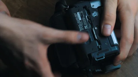 Playing an old mini-dv tape on a camcorder. Stock Footage 99701261