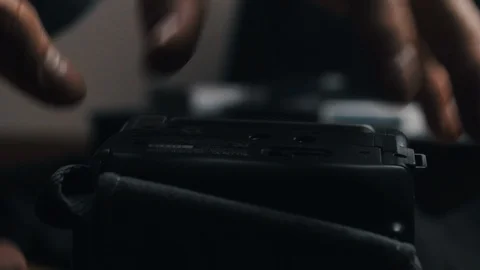 Playing an old mini-dv tape on a camcorder. Stock Footage 99701267