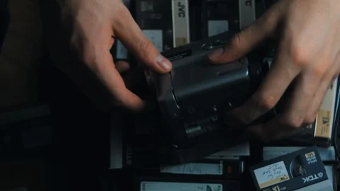 Playing an old mini-dv tape on a camcorder. Stock Footage 99701270