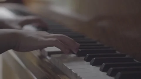 Playing an old piano, slide Stock Footage 55343868