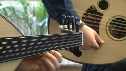 Playing oud, close-up fingers Stock Footage 86822259