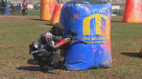 Playing Paintball Stock Footage 4237297
