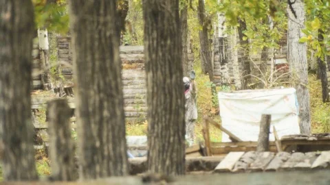 Playing paintball in the Woods Stock Footage 93328943