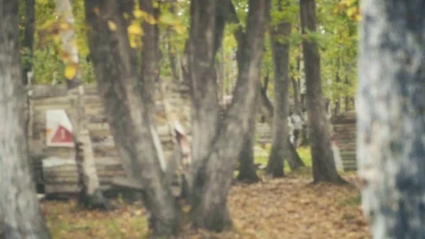 Playing paintball in the Woods Stock Footage 93330299