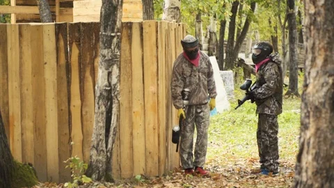 Playing paintball in the Woods Video stock 93330735