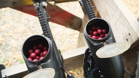 Playing paintball in the Woods Stock Footage 93331146