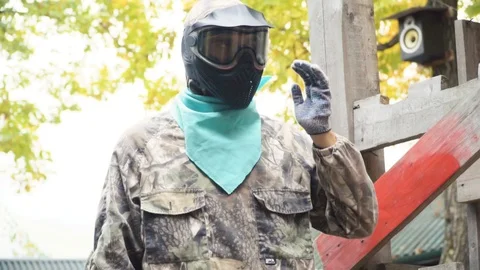 Playing paintball in the Woods Stock Footage 93331850