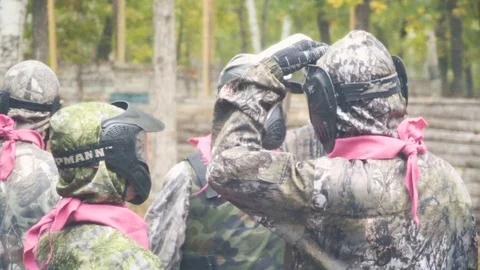 Playing paintball in the Woods Stock Footage 93331985