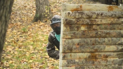 Playing paintball in the Woods Stock Footage 93332684