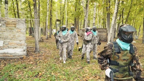 Playing paintball in the Woods Stock-Footage 93334713