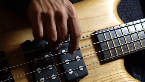 Playing pass guitar, close up Stock Footage 101584355