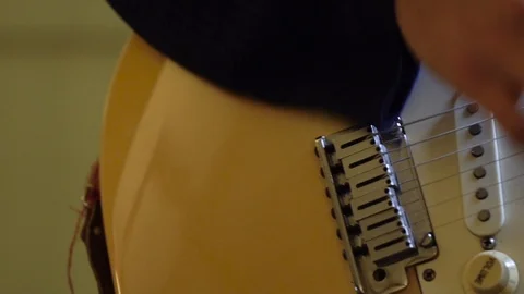 Playing pass guitar to practice Stock Footage 101582037