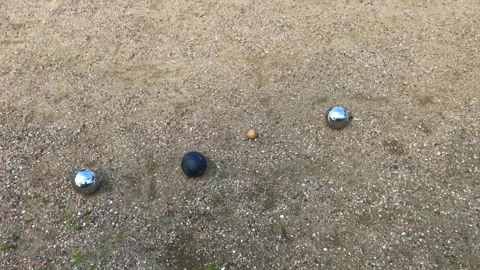 Playing petanque or boule during tournament outdoors. Stock Footage 295879783