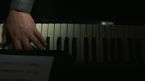 Playing the piano 10 Stock Footage 12712591
