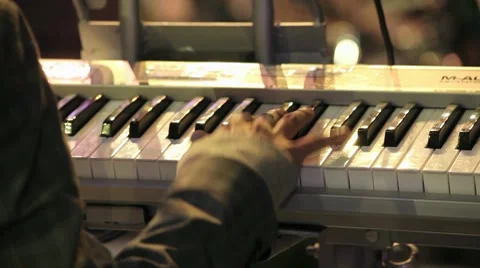 Playing the piano Stock Footage 8649930