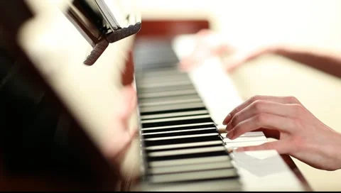 Playing piano Stock Footage 10678309