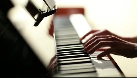 Playing piano Stock Footage 10678323