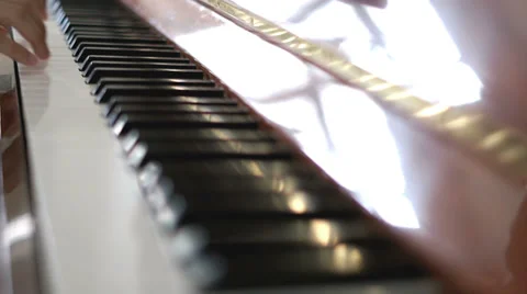 Playing piano Stock Footage 30201952