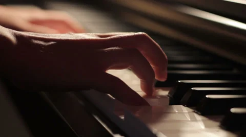 Playing piano Video stock 33216121