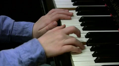 Playing piano Vídeo Stock 46017229