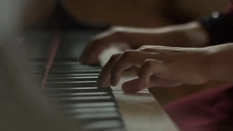 Playing  on the piano Video stock 69125198