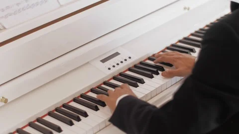 Playing the piano Video stock 102507645