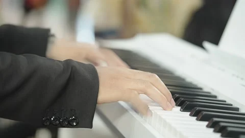Playing piano 스톡 동영상 164818559