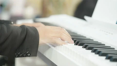 Playing piano Video stock 164818623