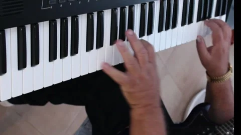 Playing the piano Stock Footage 315003454