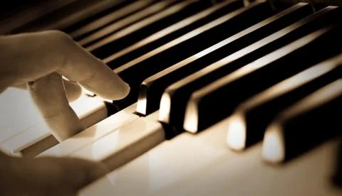 Playing piano Stock Photos