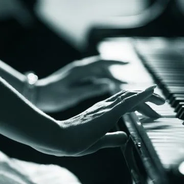 Playing piano Stock Photos