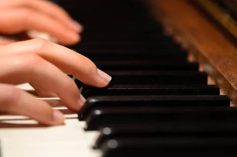 Playing piano Stock Photos