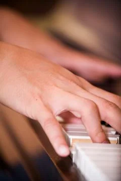 Playing piano Stock Photos