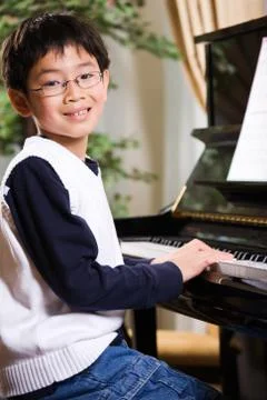 Playing piano Stock Photos