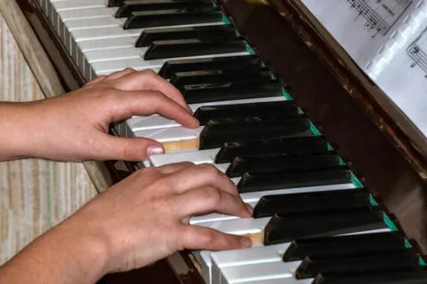 Playing the piano. Stock Photos