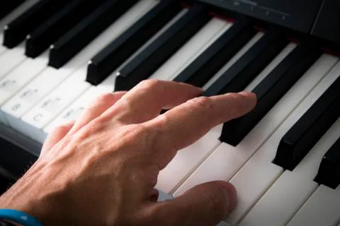 Playing the piano Fotos de archivo