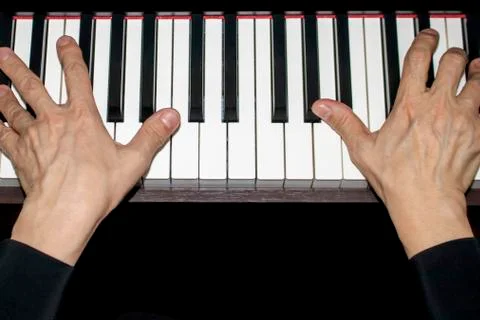Playing the piano. Stock Photos