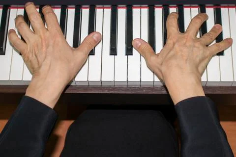Playing the piano. Stock Photos