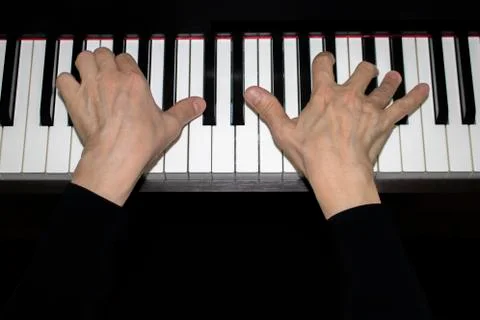 Playing the piano. Stock Photos